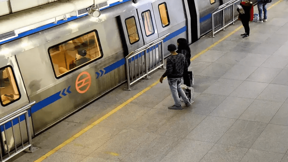 Passengers on Delhi Metro following travel safety tips and guidelines for a secure and comfortable journey.
